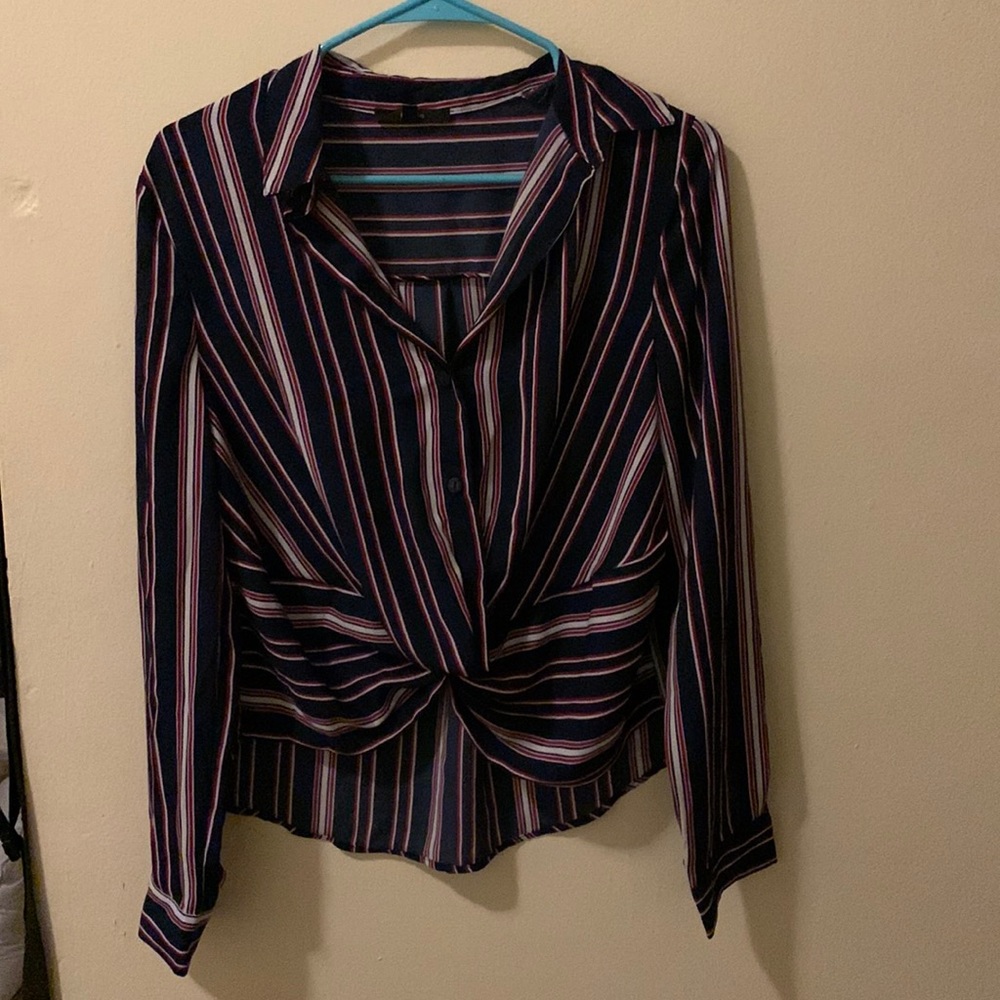 This is a multi colored button up in a U.S medium.
